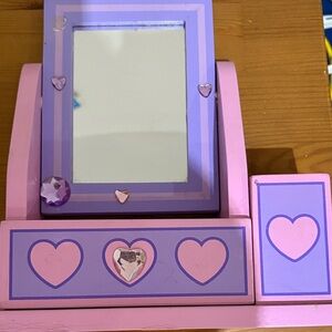 Pink and purple wooden vanity set from Melissa&Doug